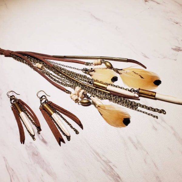 Long Necklace with Brown Suede, Feathers, Stones, Antique Brass Chain and Beads accented with 22 Caliber Bullets with matching Earrings.