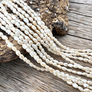 3-4mm Baroque Freshwater Pearl Strand, Double-Sided Polished, White AAA Grade