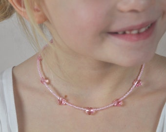 Childrens necklace "Petites Fleurs" made with faceted glass seed beads and Swarovski crystal flowers