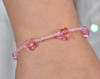 Childrens bracelet "Petites Fleurs" made with faceted glass seed beads and Swarovski crystal flowers