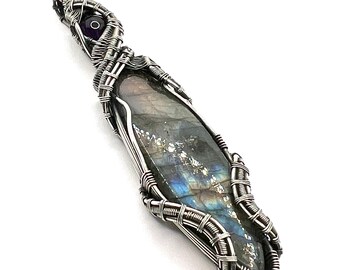 Labradorite gemstone pendant with Amethyst wire wrapped in fine silver. Magically Entering The Divine Void