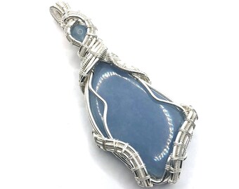 Angelite gemstone pendant with Celestite wire wrapped in fine silver. Calling The Angels