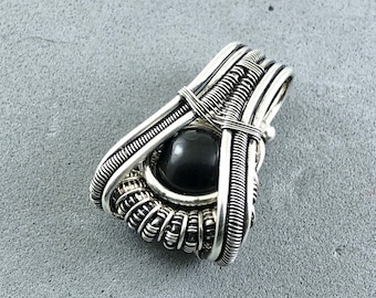 Aegirine pendant wire wrapped in silver.  Healing & Purification