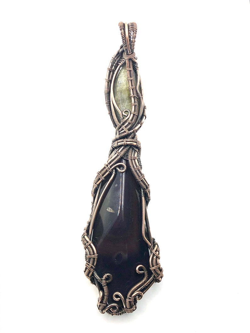 Mastering The Darkness That Lives Within Each Of Us in copper Rainbow Obsidian gemstone pendant with Labradorite and Nuummite