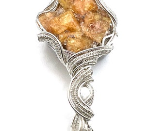 Chabazite crystal pendant with Scolecite wire wrapped in fine silver.  Zeolite Power