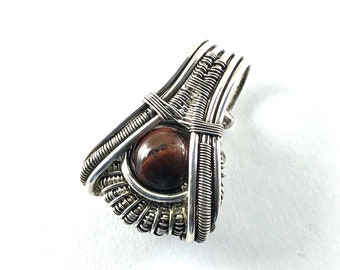 Tiger Iron gemstone pendant wire wrapped in fine silver.  Abundant Energy For Every Level