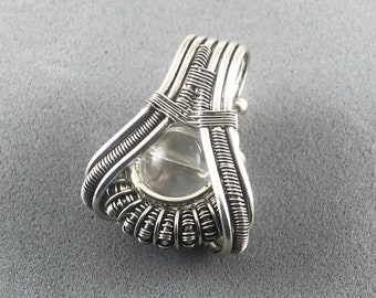 Russian Lemurian Ice crystal pendant wire wrapped in fine silver. A Powerful Stone Of Truth