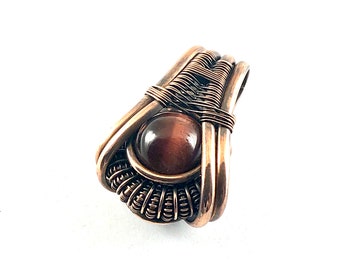 Tiger Iron gemstone pendant wire wrapped in copper.  Abundant Energy For Every Level
