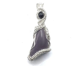 Yttrium Fluorite gemstone pendant with Iolite wire wrapped in fine silver. Expanding Psychic Awareness