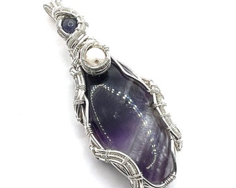 Chevron Amethyst pendant with Tanzanite & Scolecite wire wrapped in fine silver.  Strength And Serenity Through The Wisdom Of The Heart