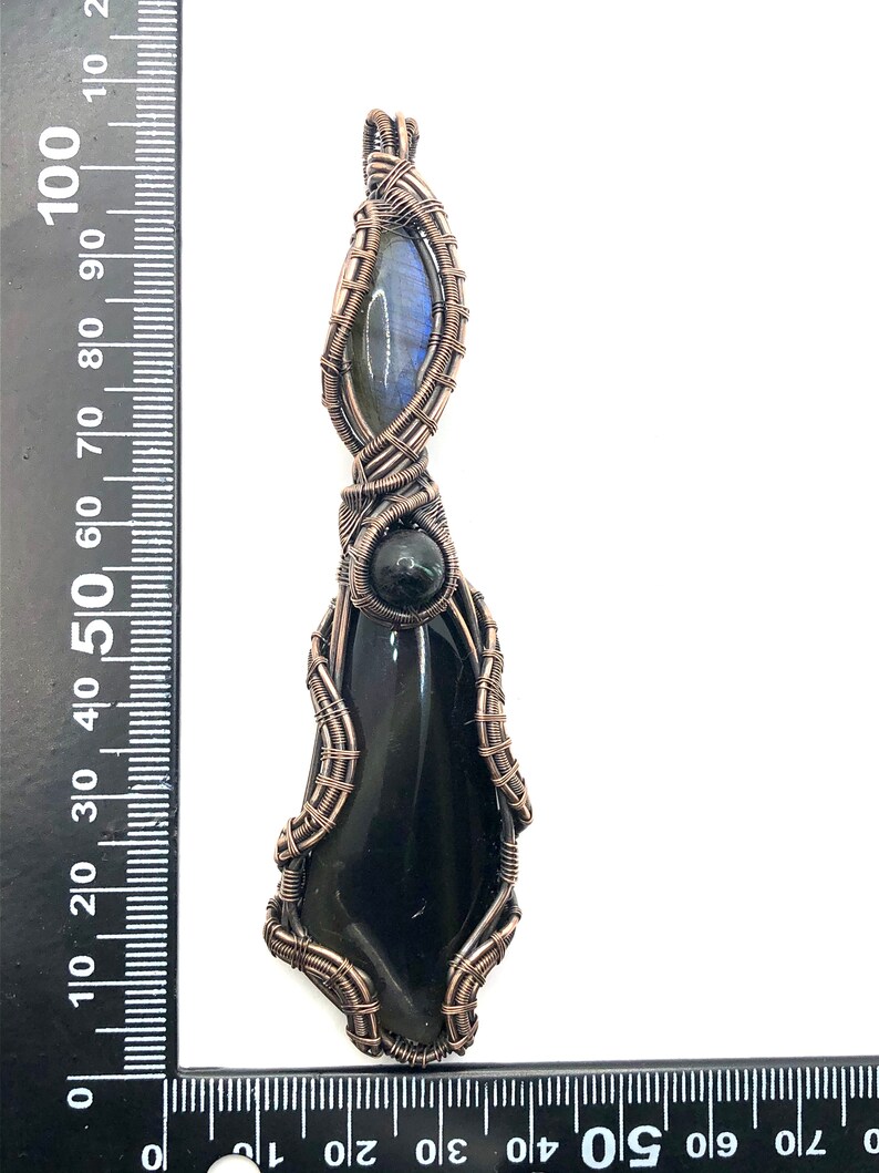 Mastering The Darkness That Lives Within Each Of Us in copper Rainbow Obsidian gemstone pendant with Labradorite and Nuummite