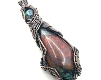 Sonoran Sunset gemstone pendant with Chrysocolla wire wrapped in copper. Verbally Expressing The Empowered Self