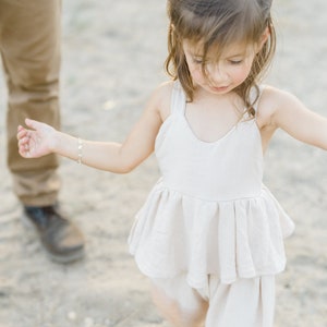 Girls boho romper linen tan, white, black with adjustable straps and ruffled waist, wide leg image 5