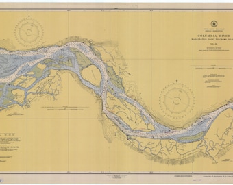 May include: A vintage nautical chart of the Columbia River, from Barrington Point to the entrance of the river. The chart is printed on yellow paper with blue and green lines and markings. The chart includes a compass rose and depth soundings.