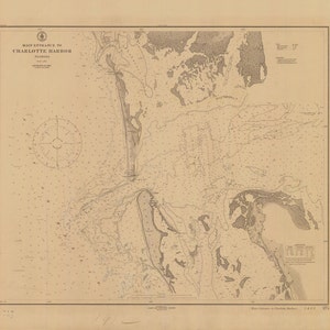 May include: A vintage nautical chart of the main entrance to Charlotte Harbor, Florida. The chart shows the coastline, waterways, and depths of the harbor. The chart is printed on a beige background with brown lines and text.