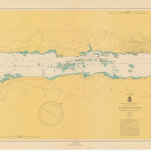 May include: A vintage nautical chart of the St. Lawrence River, showing the area around Brockville, Ontario, Canada. The chart is printed on yellow paper with blue and green markings. The chart includes a compass rose and a legend.