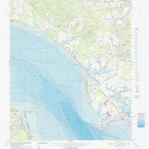 May include: A detailed topographic map of the Piney Point, MD area. The map shows the coastline, waterways, and surrounding land features. The map is printed in black, blue, and green on a white background. The map is titled "Piney Point Quadrangle" and includes a scale bar and legend.