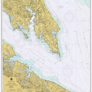 May include: A nautical chart of the Potomac River, Chesapeake Bay to Point Lookout, Maryland and Virginia. The chart shows the river and bay with detailed markings for depths, shoals, and other navigational hazards. The chart is printed in black and white with a yellow background.