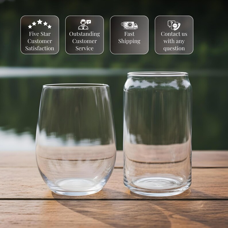 two empty wine glasses placed side by side on a wooden surface, with a blurred background.