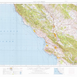 May include: A vintage map of San Luis Obispo, California, showing the coastline, roads, and terrain features. The map is printed on a light blue background with brown lines and text. The map includes the text "PACIFIC OCEAN" and "SAN LUIS OBISPO".