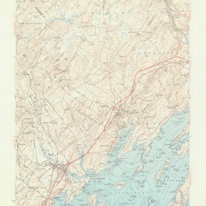 May include: A vintage topographic map of Freeport, Maine, showing the coastline, rivers, and roads. The map is printed in shades of blue, green, and brown, with red lines indicating roads and other features. The map is titled "Freeport Quadrangle, Maine" and includes the text "15 Minute Series Topographic."