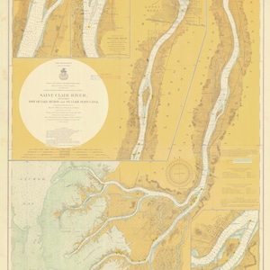 May include: A vintage nautical chart of the Saint Clair River, showing the foot of Lake Huron and the St. Clair Flats Canal. The chart is printed on a yellowed paper with brown and blue lines indicating the river and canal. The chart is marked with yellow dots indicating points of interest.