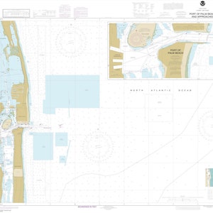May include: A nautical chart titled "Port of Palm Beach and Approaches" with detailed information. The map features coastal outlines, depth soundings, and navigational markers. The chart includes the North Atlantic Ocean and surrounding areas, with a scale and reference numbers.