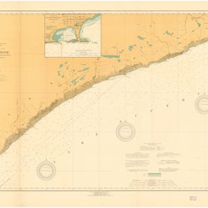 May include: A vintage nautical chart of Lake Superior, showing the shoreline and surrounding waters. The chart is printed on a cream-colored paper with brown and blue lines and text. The chart includes a compass rose and a scale bar.