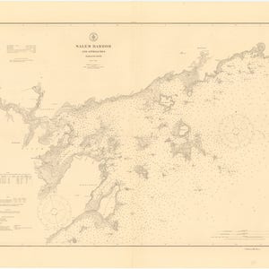 May include: A vintage nautical chart of Salem Harbor and its approaches, Massachusetts. The chart is printed on cream-colored paper and features detailed markings for depths, shoals, and other navigational hazards.