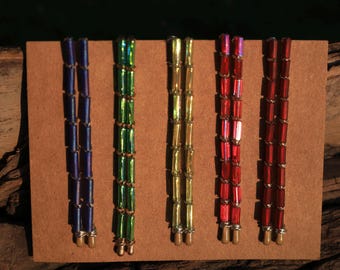 Horquillas con cuentas de corneta