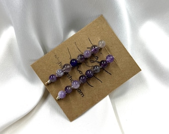 Horquillas con cuentas de amatista