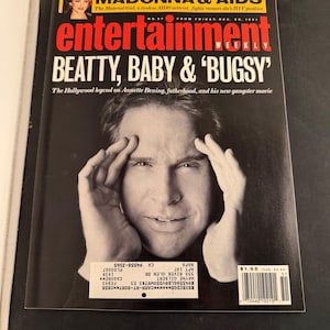 May include: A December 20, 1991 issue of Entertainment Weekly magazine featuring a black and white portrait of Warren Beatty on the cover. The headline reads Beatty, Baby & Bugsy, with a smaller inset photo of Madonna and text about AIDS.