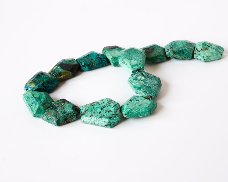 Chrysocolla Flat Tumble Faceted appx 24x8mm Exceptional 16 inch full strand.One of a kind #242 Self creative pattern on it naturally