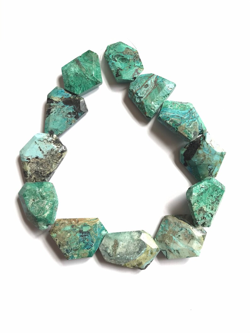 Chrysocolla Flat Tumble Faceted appx 24x8mm Exceptional 16 inch full strand.One of a kind #242 Self creative pattern on it naturally