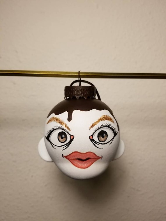 A hand-painted kawaii marshmallow character turned into a custom Christmas ornament — tiny, collectible, and feels like a designer toy dropped into your tree.