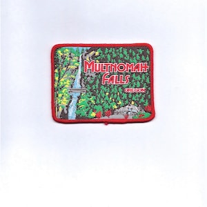May include: An embroidered patch featuring a picture of Multnomah Falls in Oregon. The text "Multnomah Falls" is in red and the text "Oregon" is in blue.