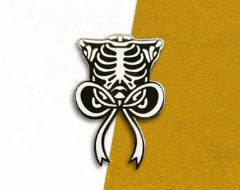 Ribbon Ribcage Enamel Pin – Gunmetal Skeleton Lapel Pin (1.5")