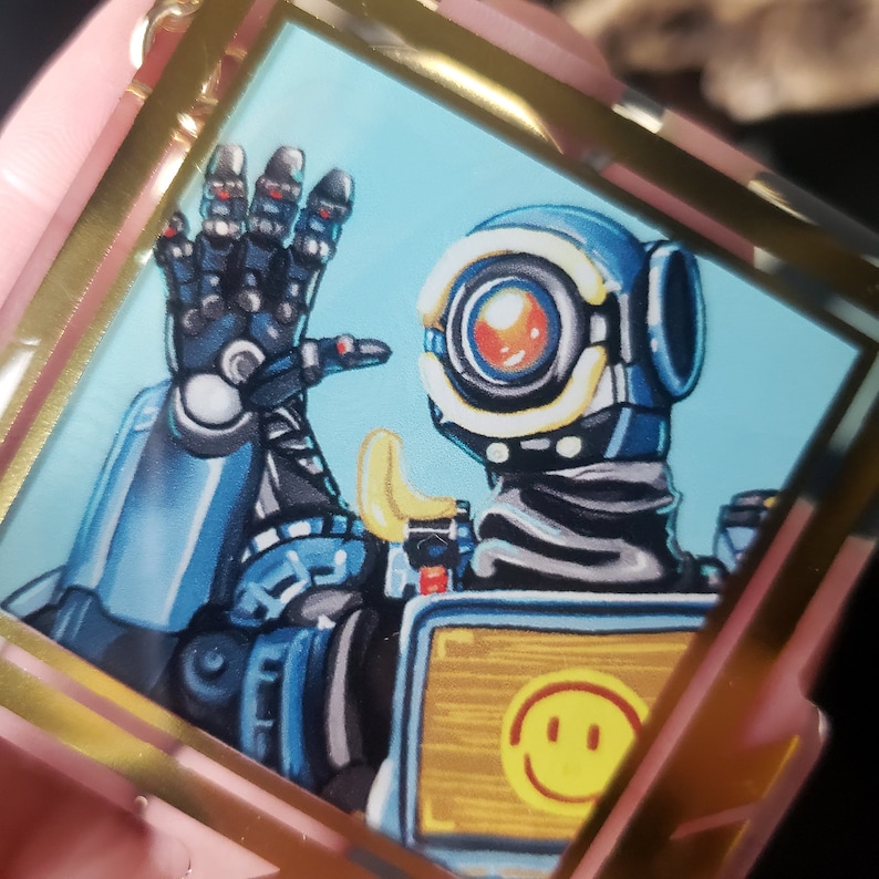 May include: A cartoon illustration of a robot character with a large, round, white eye with a red iris. The robot is wearing a blue and black suit with a yellow banana-shaped object on its shoulder. The robot is holding its hand up in a wave. The robot is in a gold frame with a blue background.