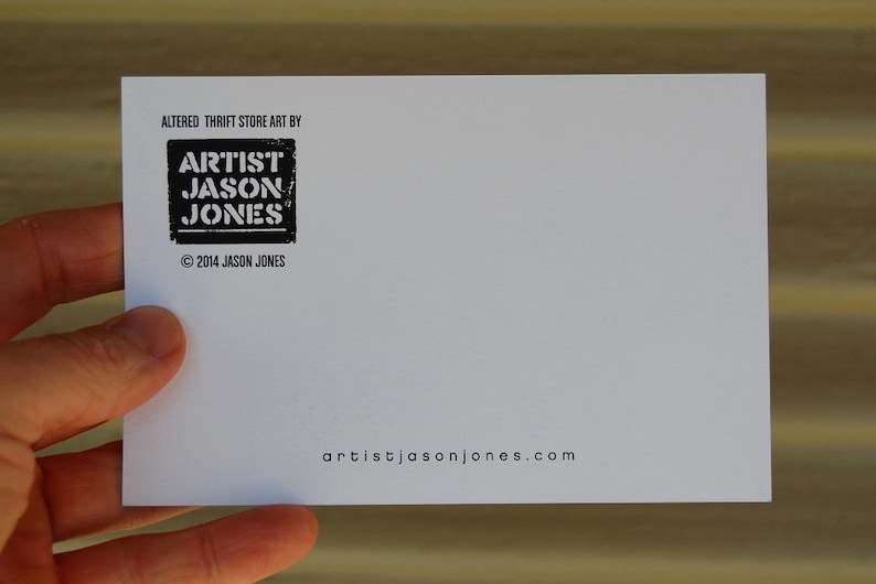 Pode incluir: Cart&atilde;o branco com texto preto que diz "Altered Thrift Store Art By Artist Jason Jones" e "artistijasonjones.com". Copyright 2014 Jason Jones.