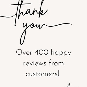 May include: A cream-colored graphic with black script that reads "thank you" and "Over 400 happy reviews from customers!" The signature "Annie" is at the bottom. The design is simple and elegant.