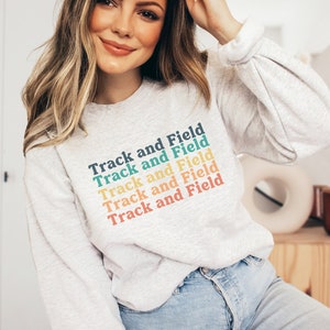 track and field sweatshirt, Track & Field Crewneck Sweatshirt, track and field team, track and field team image 1