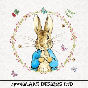May include: A watercolor illustration of Peter Rabbit, a brown rabbit wearing a blue jacket, standing in the center of a wreath of pink and green flowers. The wreath is decorated with butterflies, bees, and other floral elements.