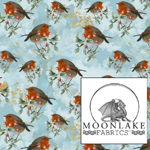May include: A seamless pattern featuring a repeating design of red robins perched on branches with red berries against a light blue watercolor background with gold flecks. The pattern includes the text "MOONLAKE FABRICS".