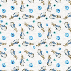 May include: A repeating pattern of brown rabbits wearing blue jackets and blue flowers on a white background.
