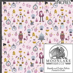 May include: Pink fabric with a repeating pattern of Christmas-themed illustrations. The pattern includes gingerbread men, nutcrackers, snowmen, ornaments, and a Christmas tree. The fabric is printed with the text "MOONLAKE FABRICS" and "Bespoke and Custom Fabrics Printed to Order".