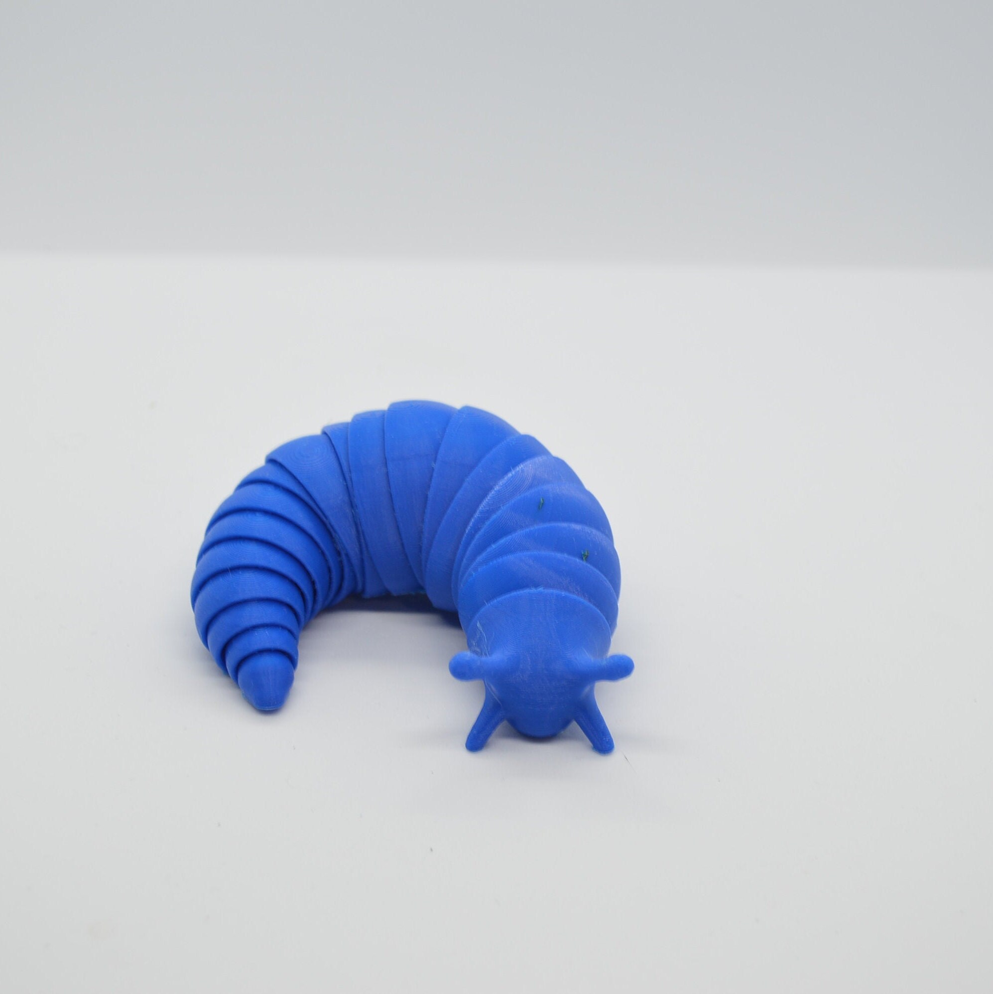 articulated slug fidget toy