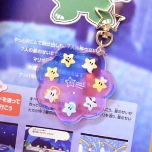 Star Spirits Rainbow Acrylic Keychain | 2.5 inches | Fan Inspired Cosmic Space Iridescent Charm