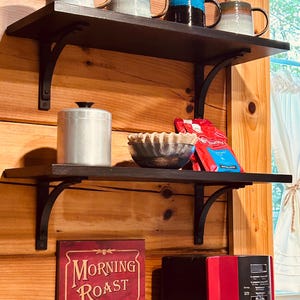 Airbnb cabin coffee nook using our flat black, 6" Station brackets with dark painted shelving