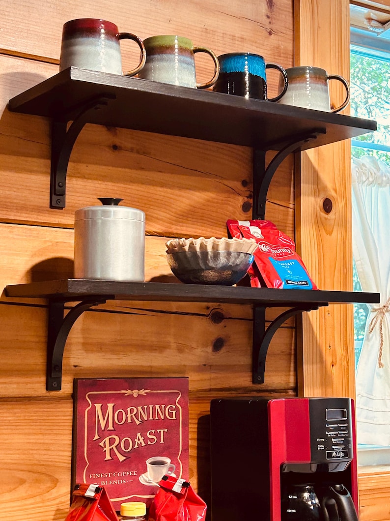 Airbnb cabin coffee nook using our flat black, 6" Station brackets with dark painted shelving