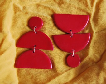 Bold Red Half-Moon Chandeliers
